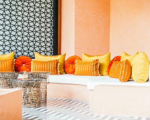 Beautiful luxury pillow on sofa decoration in living room interior - Vintage Light Filter