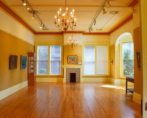 wide-angle-shot-interior-building-including-pictures-chandelier-doors
